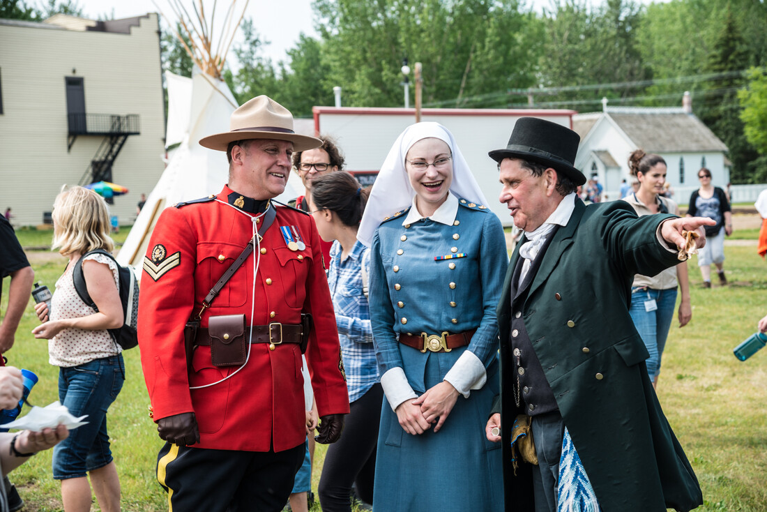 Costumed Interpreters interacting during a Fort Edmonton Park Celebration