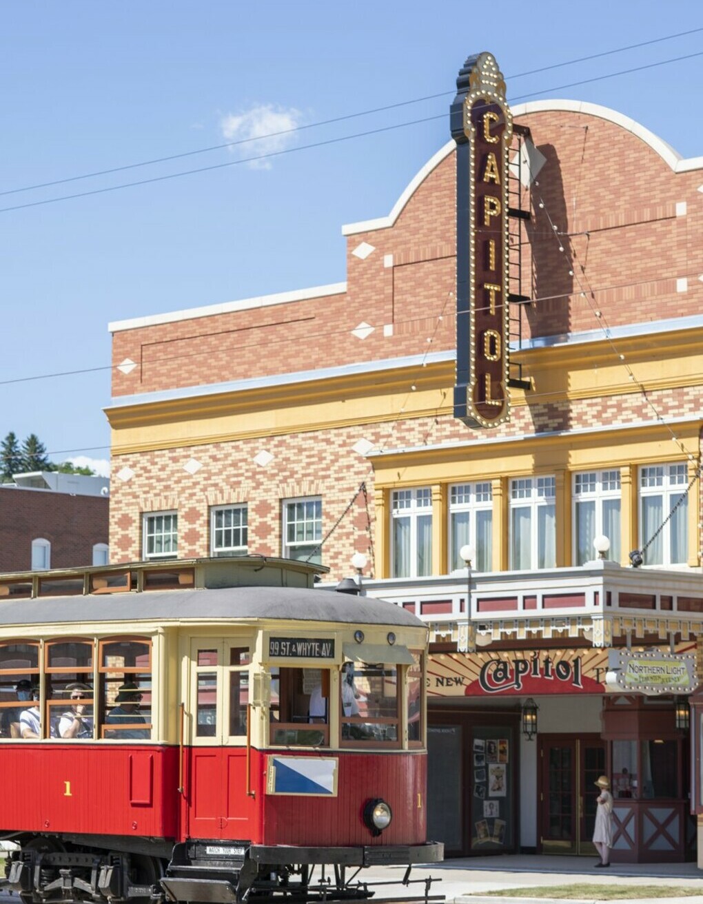 Streetcar passing by the Capitol Theatre on 1905 Street